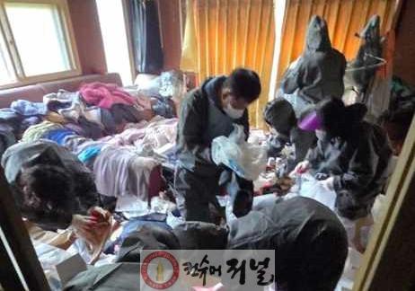 2.전곡읍협의체, 쓰레기 더미 속 소외이웃에 청정 보금자리 선물2.jpg